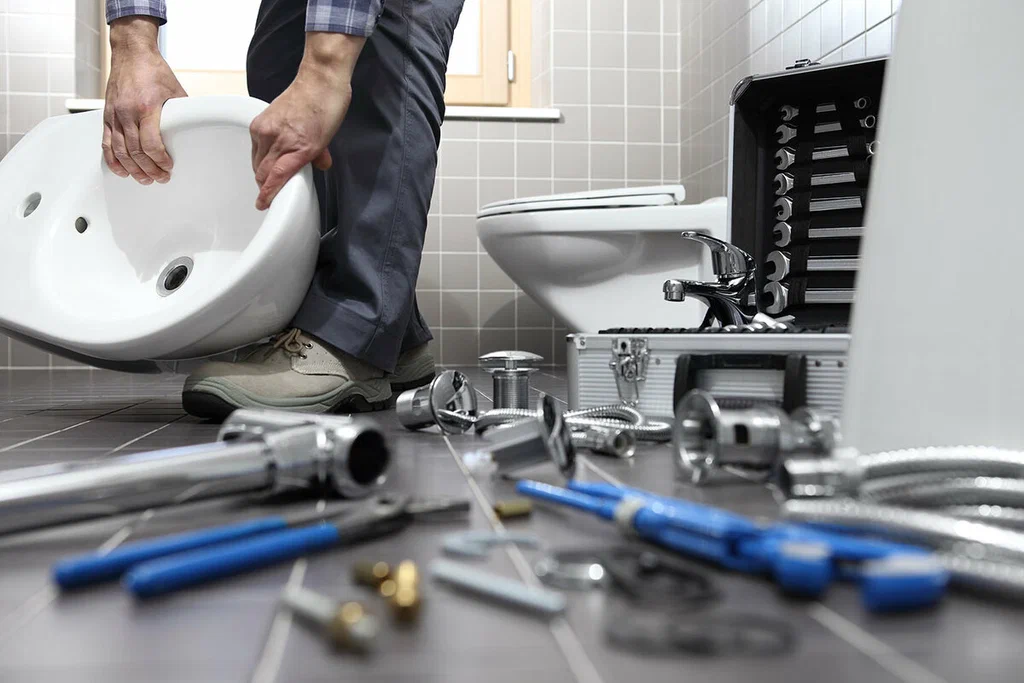 Plumbing tools prepared for a bathroom repair in Davenport